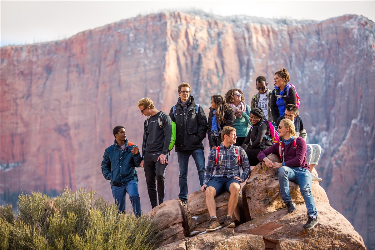 Students atop a mountain peak 13