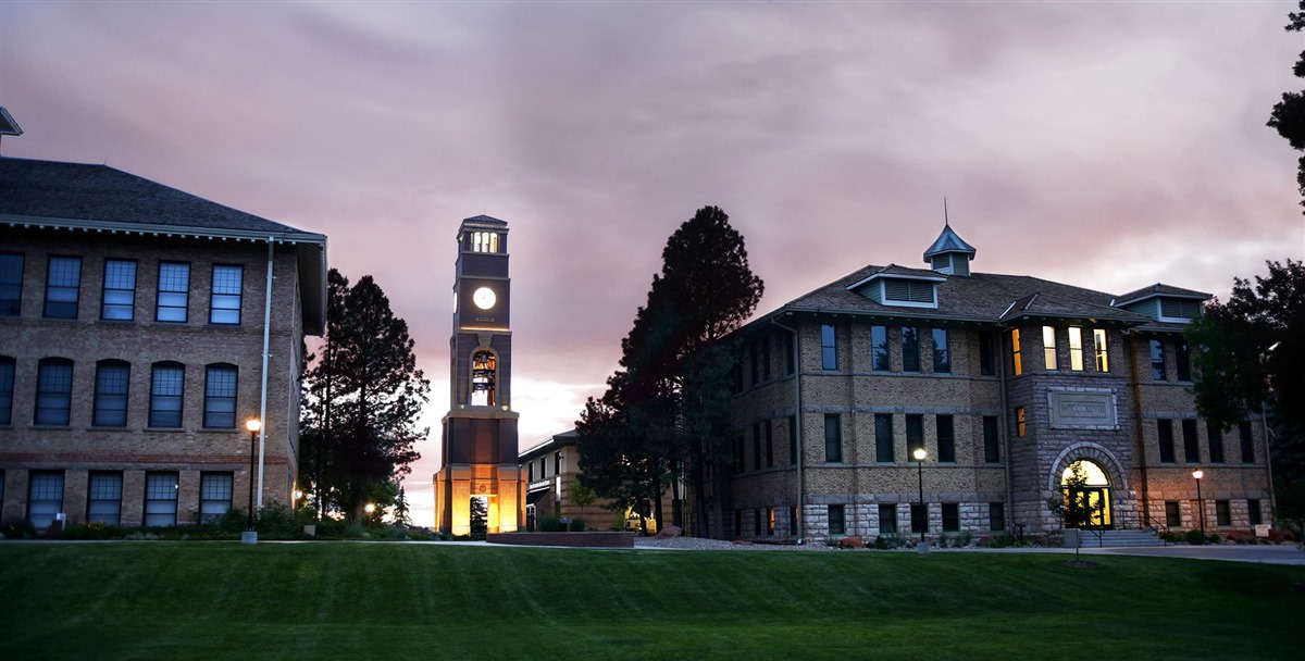 SUU's campus in front of a purple sunset 15
