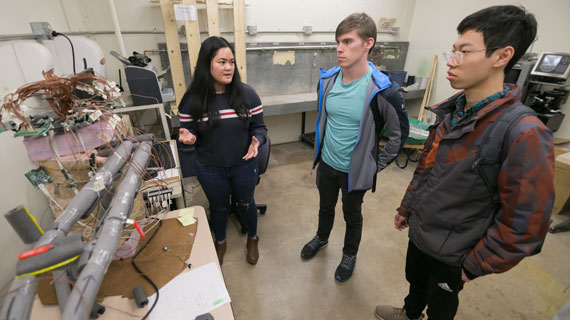 engineering student Kelly Pelicano teaching fellow students