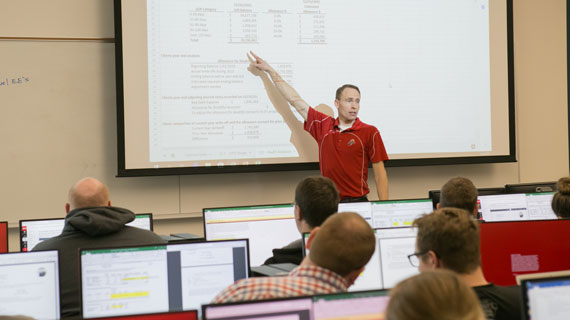 accounting professor Jeff Orton in front of the classroom