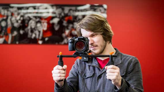 Filmmaking student with camera