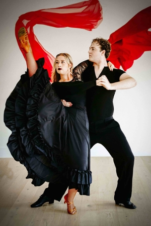 Two Students Dancing Dressed in Black 
